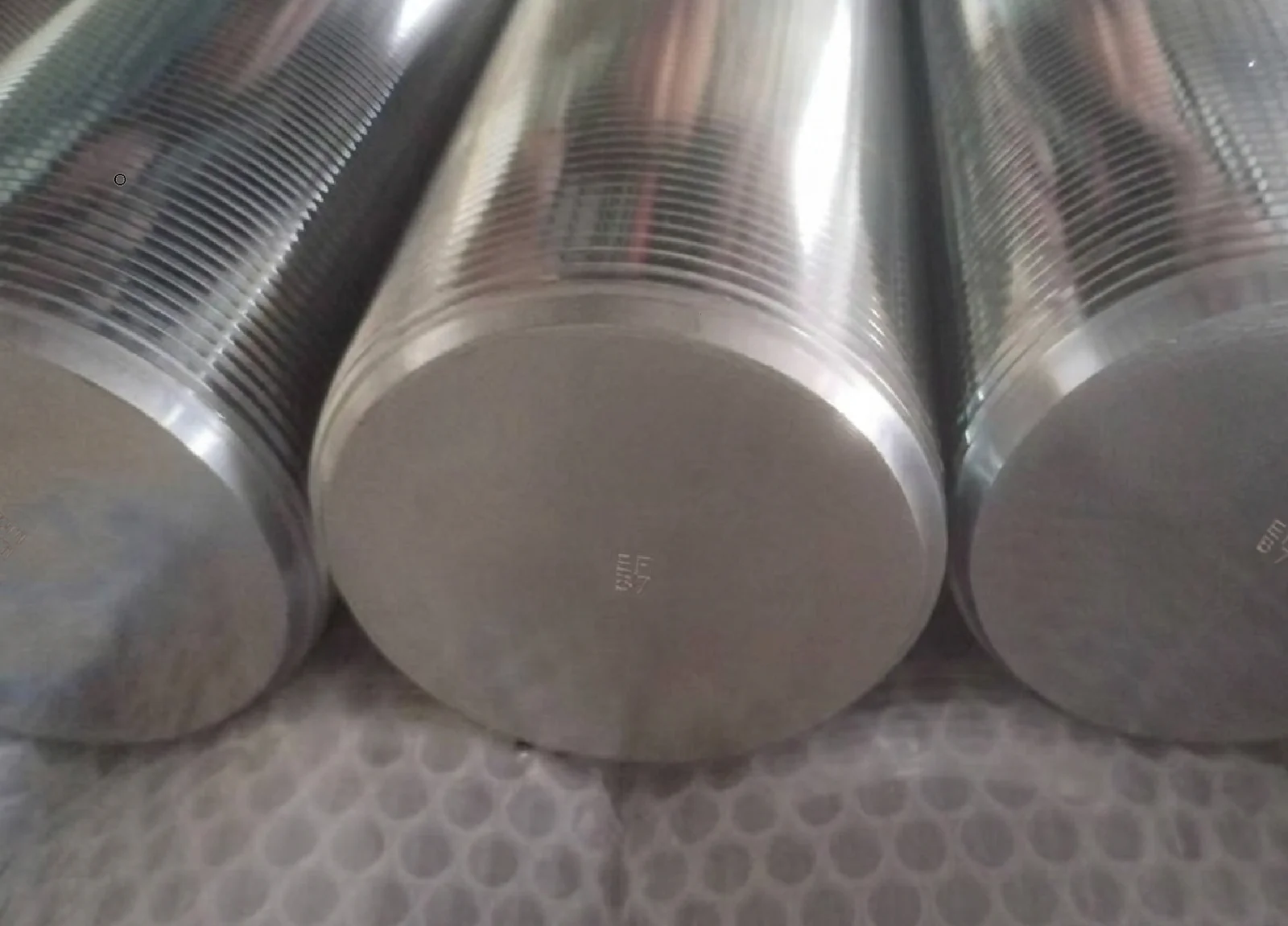 Close-up of the stud end faces showing EF and B7 identification marks