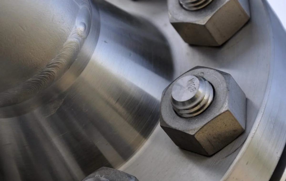 Bolted steam flange close-up for power plant piping